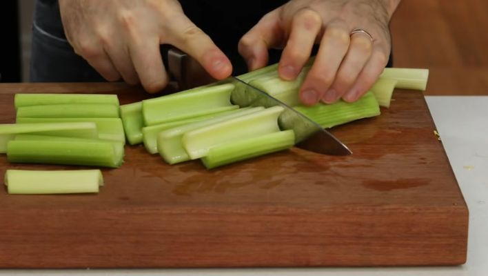 Chopping celery stalks