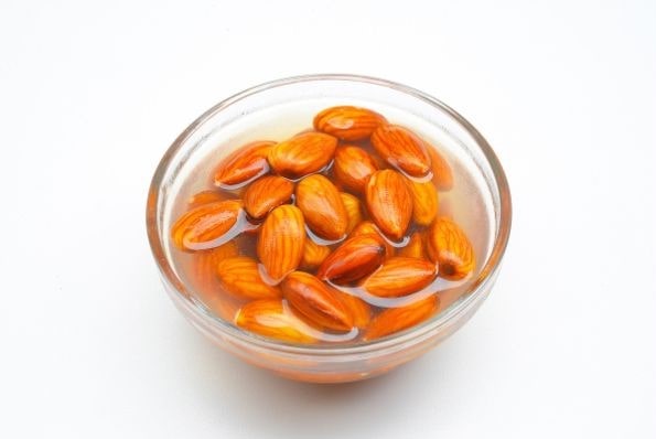Soaking almond overnight in a bowl